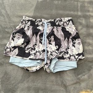 Running shorts with built in biker shorts